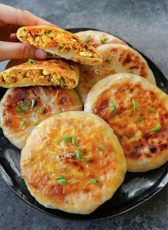 Pancakes filled with savory ingredients in Chinese style